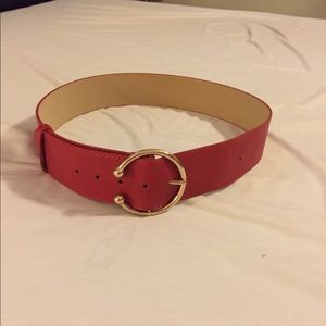 Red belt. Size large. Measured length: 45 inches.